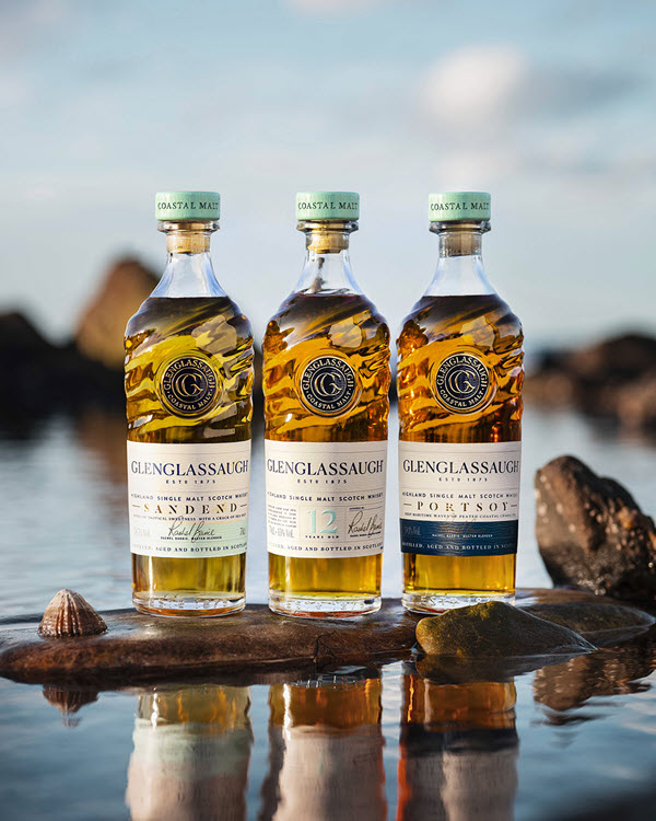 (Glenglassaugh's core range, the Sandend, Portsoy, and 12 year old, shot on a rock in a lake) Glenglassaugh didn't find its footing under Billy Walker, but current owners Brown-Forman are breathing new life into the brand
