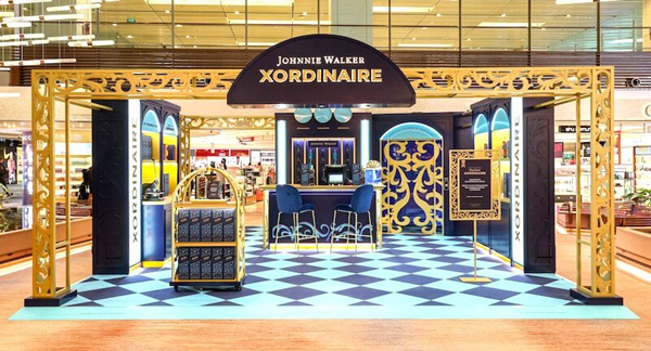 (Travel retail installation for the Johnnie Walker Xordinaire) Despite sales that still haven't hit pre-pandemic levels, brands are willing to spend big on travel retail