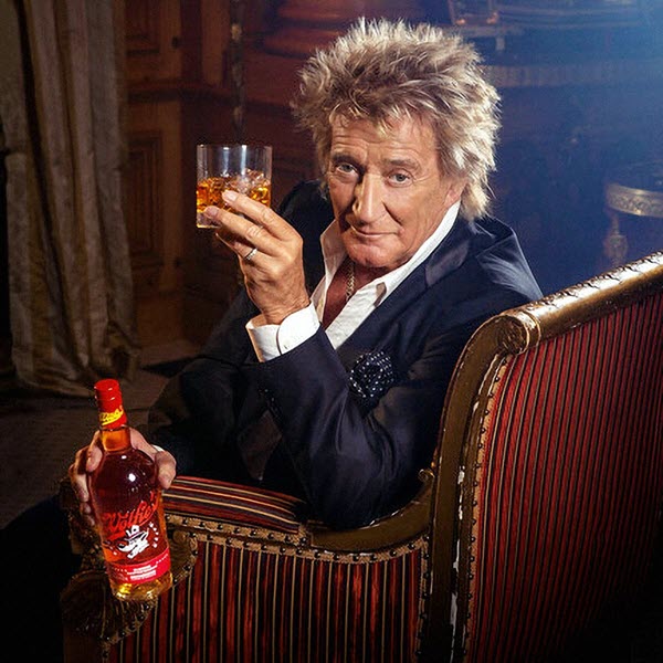 (Rod Stewart sat in an ornate chair, with a bottle of new blend Wolfie's) Often the premise of grand international campaigns, Rod Stewart's partnership with Wolfie's has a more homely feel to it