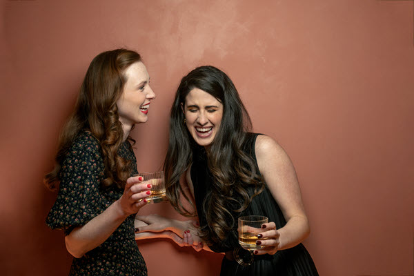 (Two women drinking whisky together) The OurWhisky Foundation is working to bring diversity that has historically been slow to break its conventions